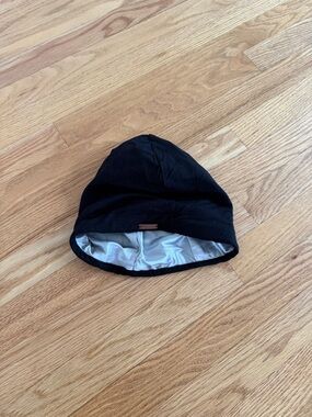 Grace Eleyae satin lined cap bonnet in black with silver lining